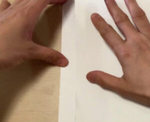 Folding a drawing paper in half